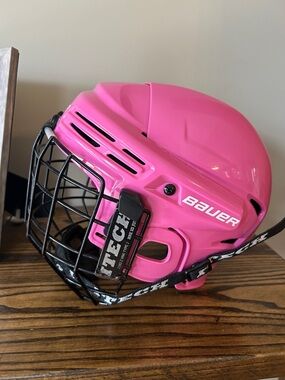 Bauer Pink Hockey Helmet with Black Cage